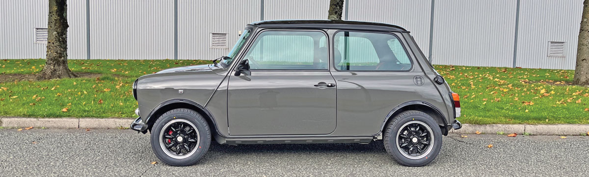 Side profile of the Mini Spectre, highlighting its sleek lines and Yukon Grey finish.
