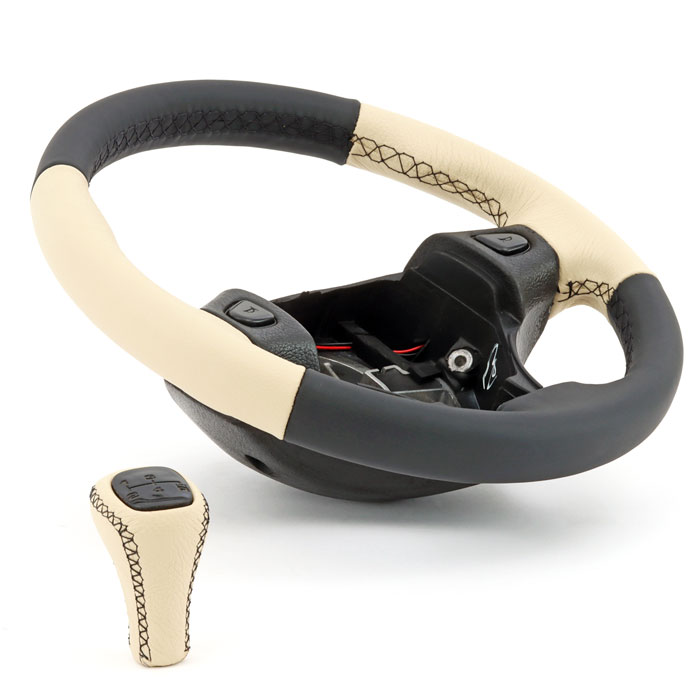 Classic Mini leather steering wheel and gearknob, both re-covered in matching premium leather for a cohesive look